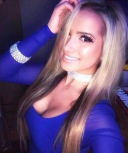 Flirty Krystal in a blue top